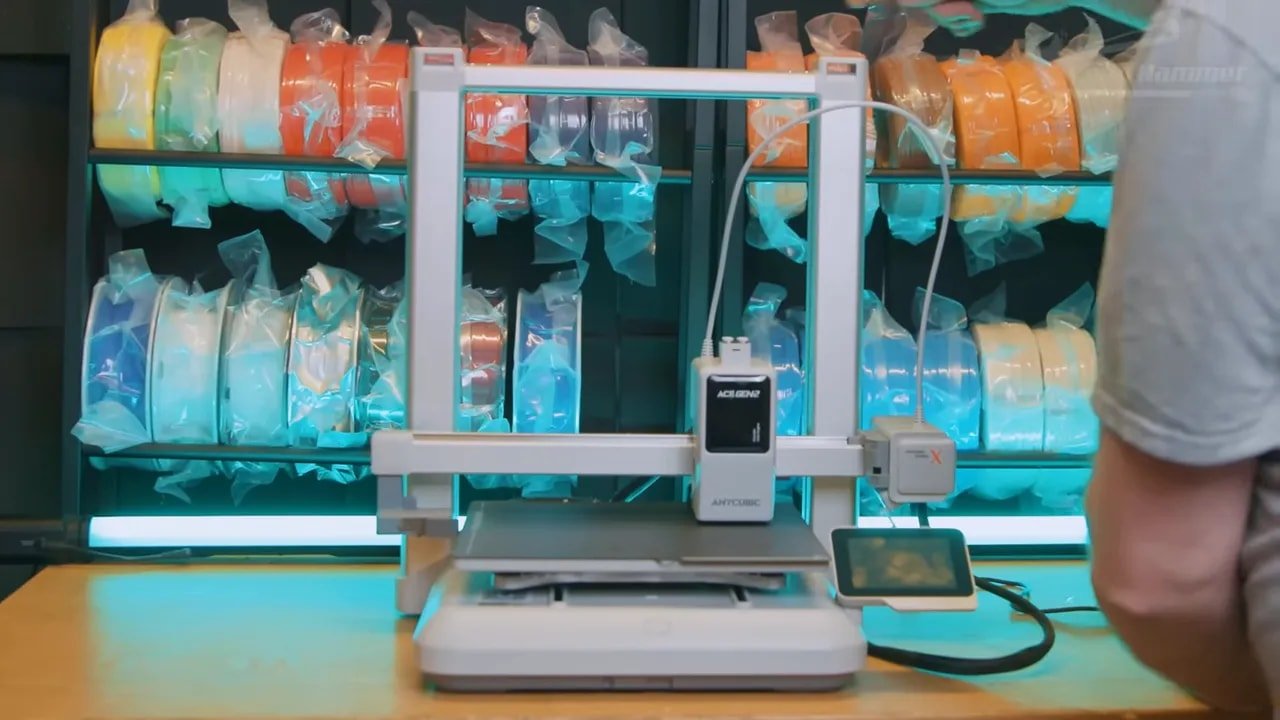 Anycubic Kobra X showing its four-material spool arrangement and toolhead feed routing