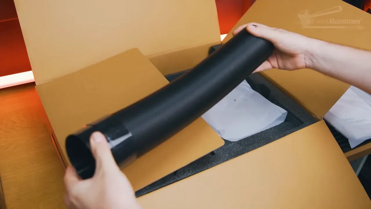 Attaching a fume extraction hose to the xTool F1 Ultra laser system