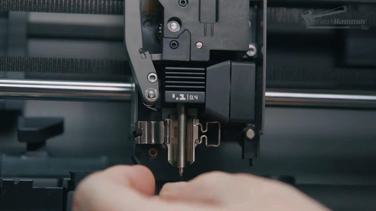Bambu P2S toolhead close-up showing nozzle assembly during maintenance