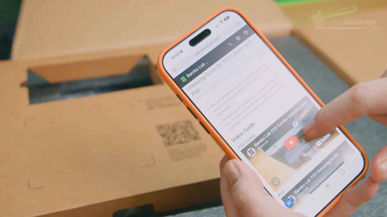 Bambu P2S unboxing setup guide displayed on a smartphone after scanning the QR code