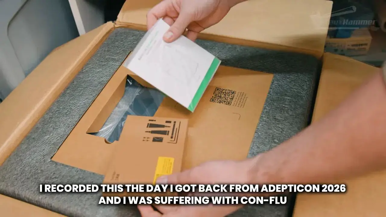 Unboxing the Bambu X2D combo with manuals and boxed components laid out
