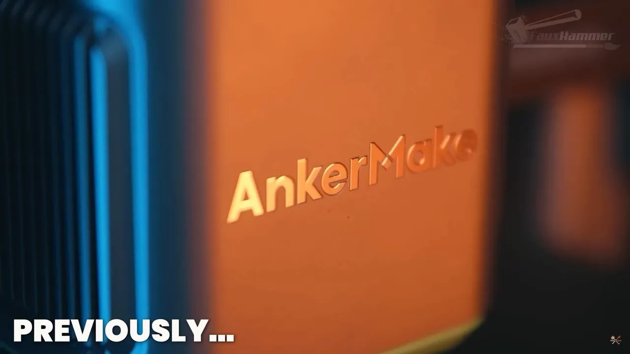 Close-up of AnkerMake branding on the printer housing with overlay text