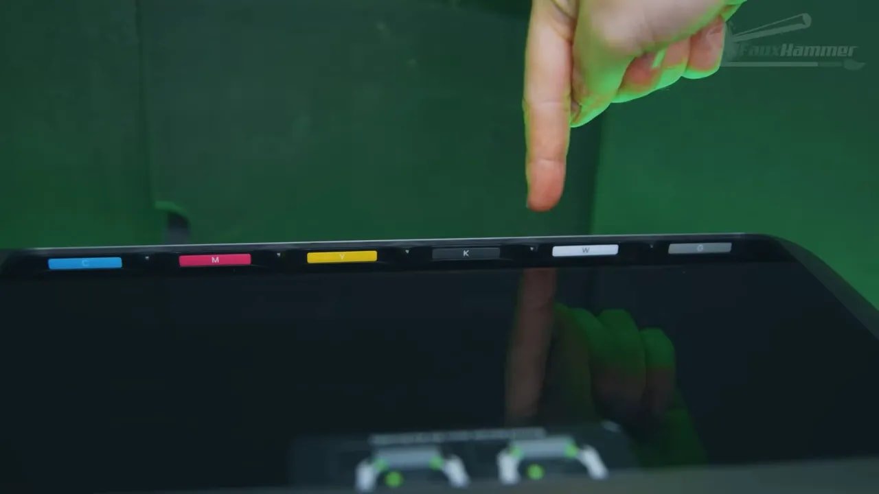 EufyMake E1 ink cartridges strip showing cyan, magenta, yellow, black, and white channels