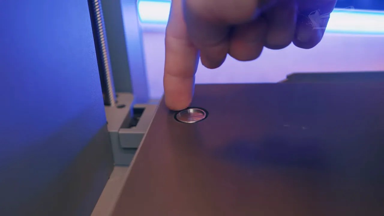 FlashForge Creator 5 nozzle positioned above the bed calibration disc