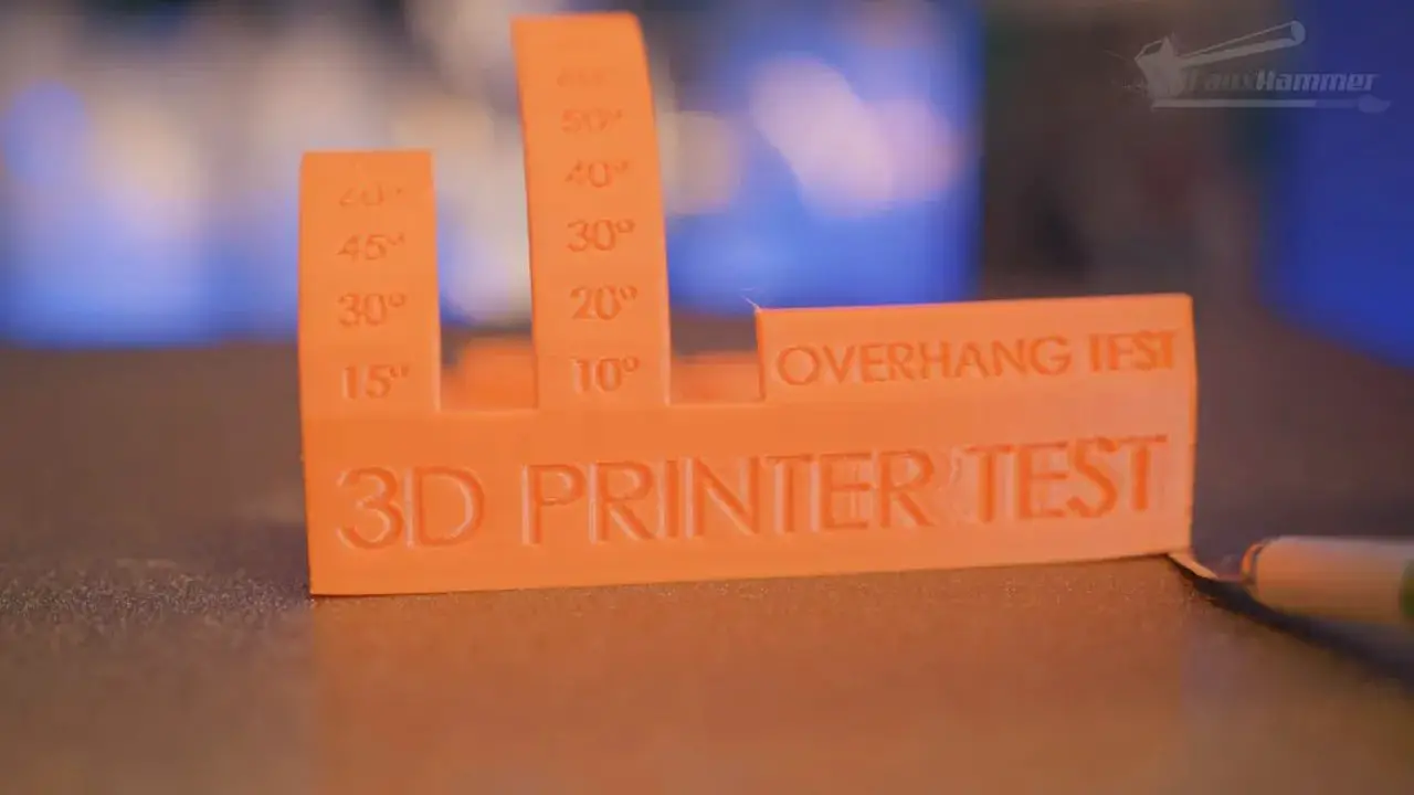 Orange overhang test print labeled with overhang angles and overhang test text