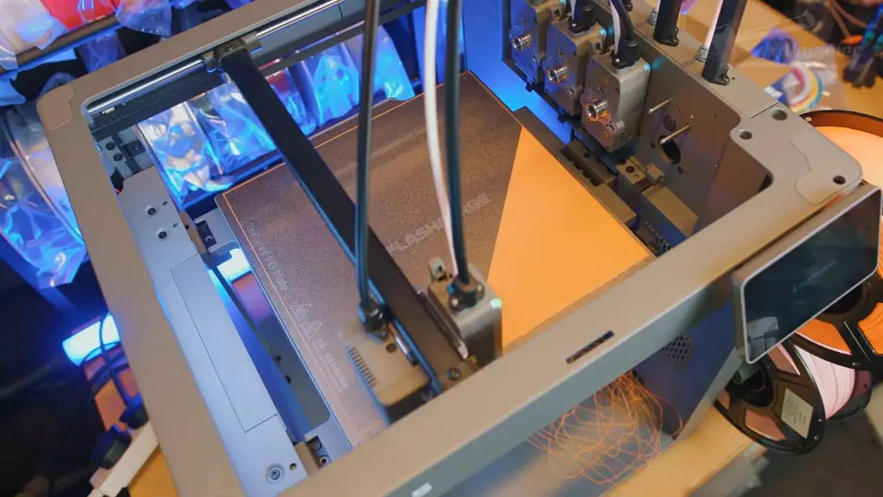 FlashForge Creator 5 printing setup with toolheads and bed visible during a multicolour print