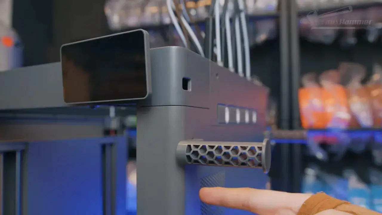 FlashForge Creator 5 side panel vent with a hand indicating the airflow openings