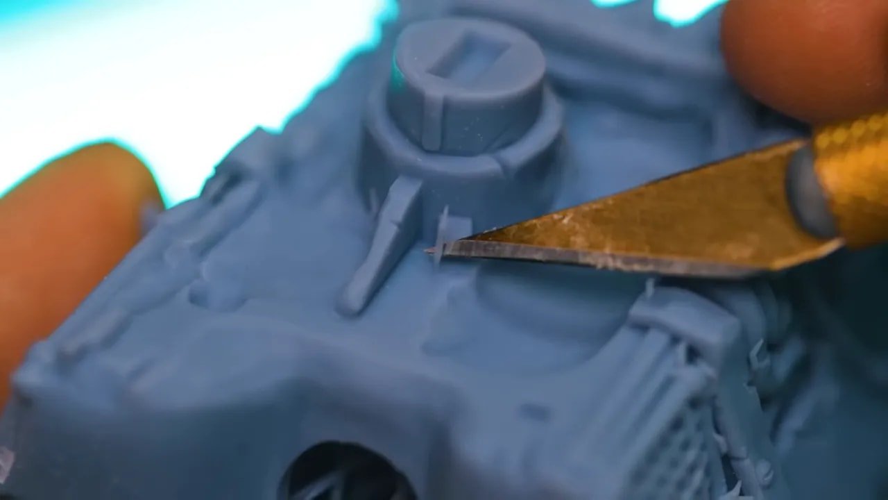 Close-up of HeyGears Reflex miniature surface near support contact points during cleanup