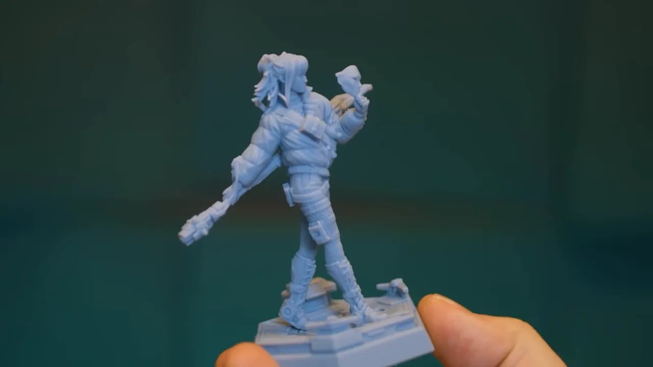 Close view of a HeyGears Reflex Part 10 resin miniature figure with detailed weapon and clothing