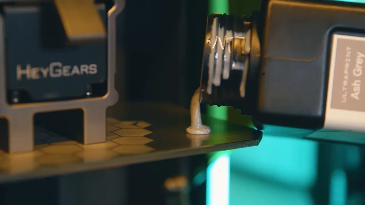 HeyGears Reflex RS resin vat screen showing the Pulsing Release Module printing action