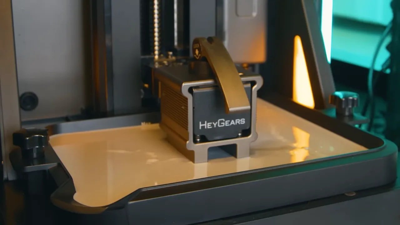 HeyGears Reflex RS running a resin print with LCD light projection visible