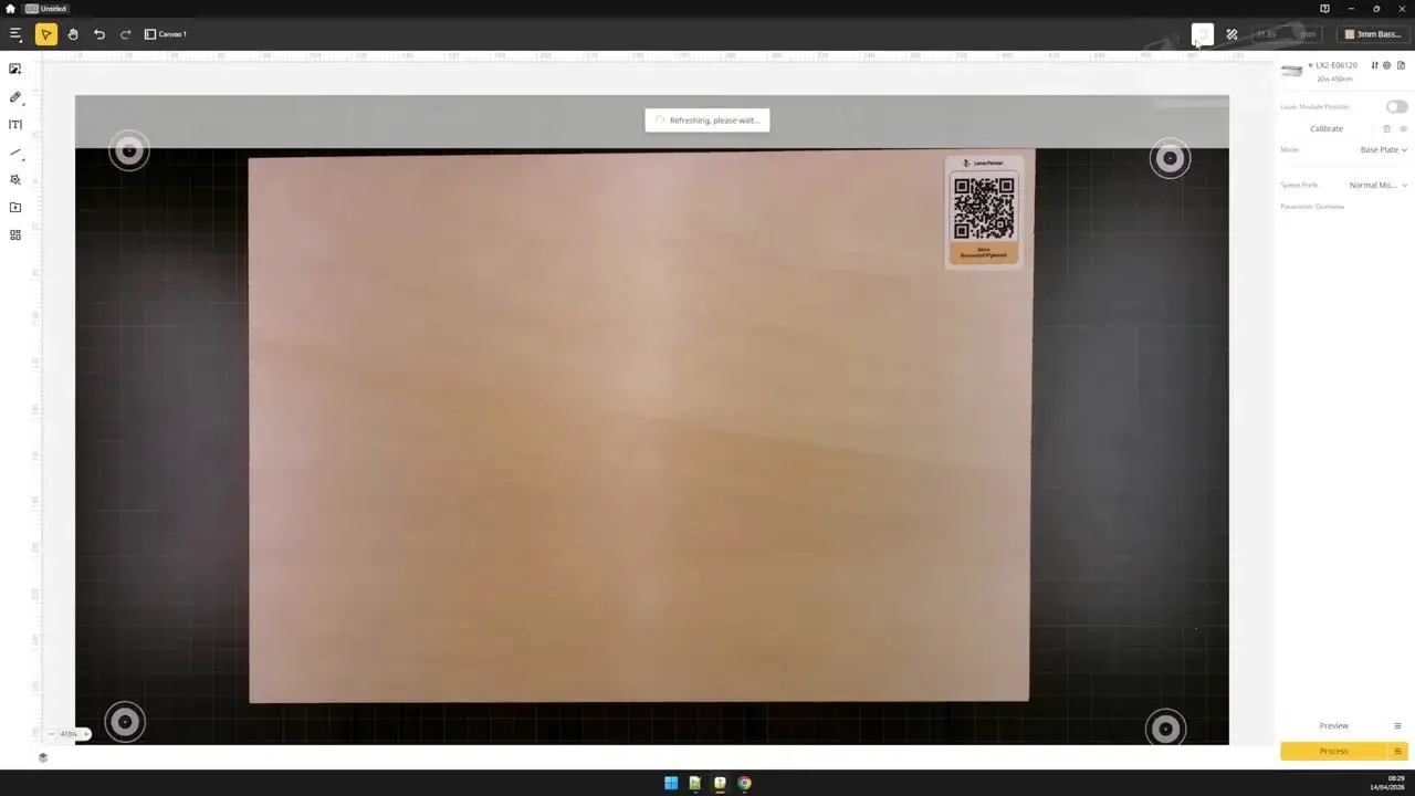 Camera view in LaserPecker Design Space showing a workspace with alignment markers and material selection area