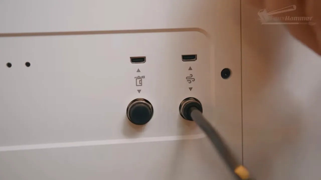 LaserPecker LX2 front panel control ports and emergency-related interface close-up