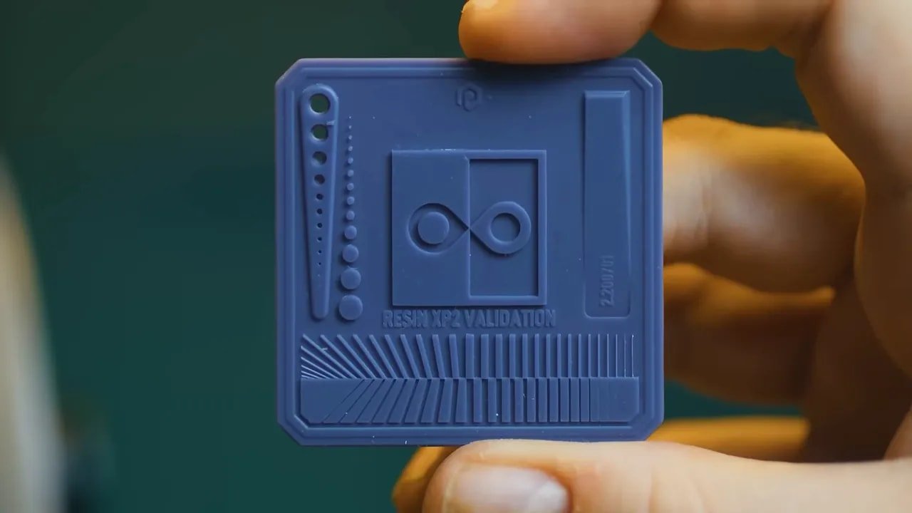Close-up of an Anycubic Photon Mono 4 resin validation test print labeled Resin XP2 Validation