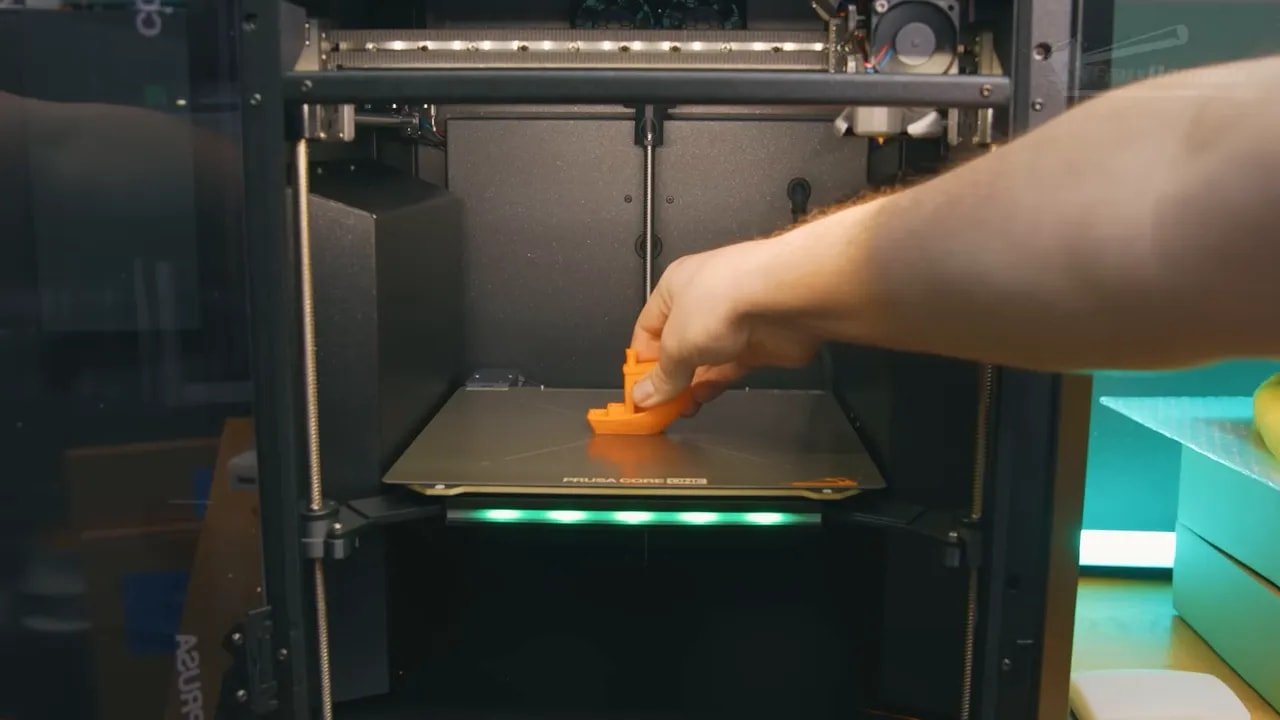 Placing a plate on the bed inside the Prusa Core One enclosed printer