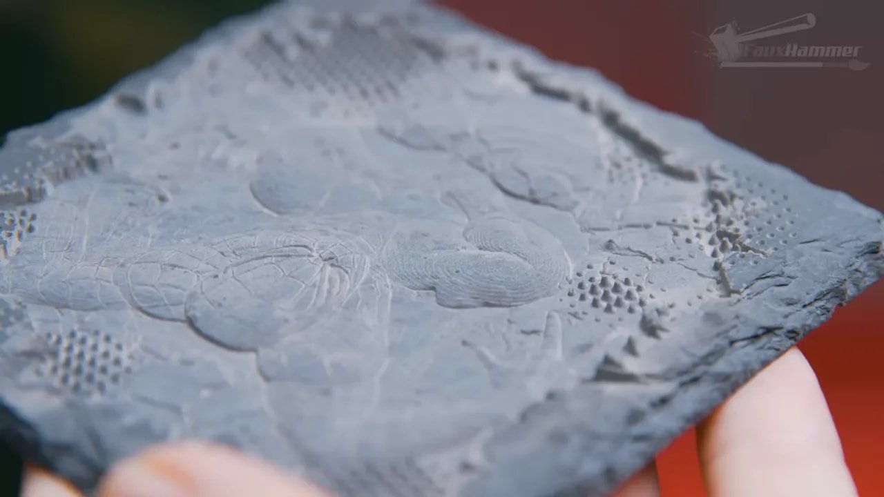 Close-up of a detailed xTool F1 Ultra engraving on a textured material