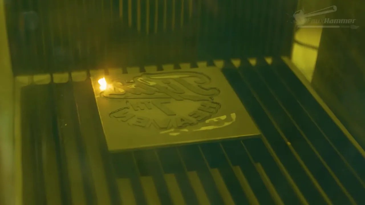 xTool F1 Ultra laser engraving a pattern with visible flare inside the enclosure